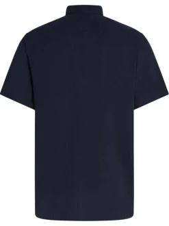 Chemise en coton marine en maille texturée pourvue d'un col à revers