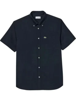 Chemise en coton marine unie avec une coupe droite et un col français