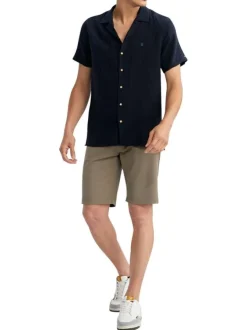 Chemise en coton marine unie pourvue d'un col cubain et d'une coupe droite