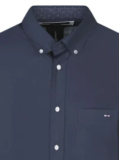 Chemise en coton marine unie pourvue d'un col à rabats et de manches longues