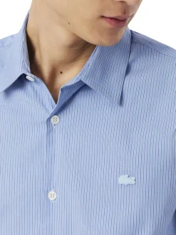 Chemise en coton mélangé bleue à coupe droite ornée d'un motif à rayures