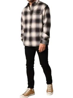 Chemise en coton noire coupe droite avec un motif à carreaux