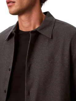 Chemise en coton noir unie coupe droite avec un col à revers