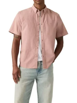 Chemise en coton rose à coupe droite pourvue d'un col boutonné