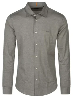 Chemise en coton verte unie avec boutonnière nacrée et logo brodé