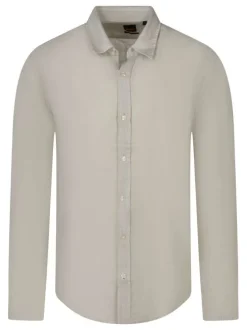 Chemise en lin beige unie pourvue d'une coupe droite et d'un col chemise