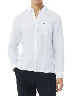 Chemise en lin bleu clair à coupe droite ornée d'un motif à rayures