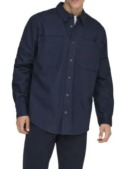 Chemise indigo unie en coton avec une coupe droite et un col à revers