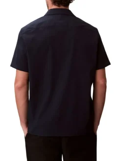 Chemise marine à coupe droite pourvue d'un col à revers et de manches courtes