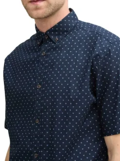 Chemise marine à pois blancs avec coupe regular fit et col boutonné