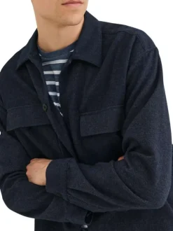 Chemise marine unie avec une coupe droite et à manches longues