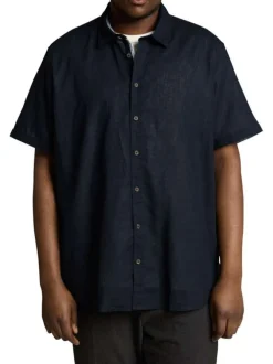 Chemise marine unie pourvue de manches courtes et d'un col français