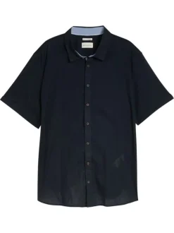 Chemise marine unie pourvue de manches courtes et d'un col français