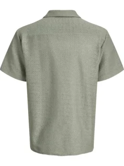 Chemise olive en crochet pourvue d'un col cubain et de manches courtes