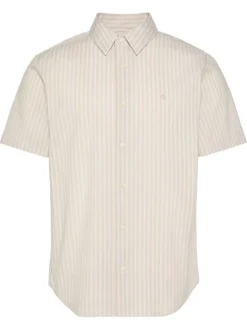 Chemise à rayures verticales en coton beige pourvue d'un col à revers