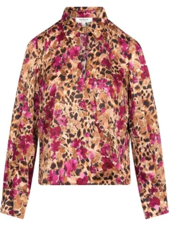 Chemisier beige à motifs fleuris avec un col à rabats et cache coeur