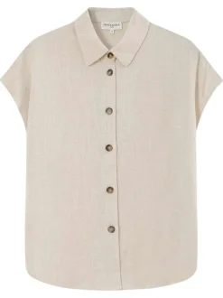 Chemisier beige uni avec une coupe droite et un col à revers