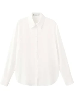 Chemisier beige uni avec une coupe droite et un col à revers