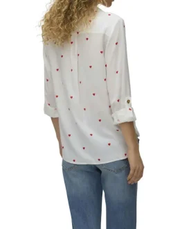 Chemisier blanc à motifs avec un col à revers et des manches longues