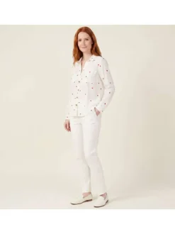Chemisier blanc à motifs avec un col à revers et des manches longues