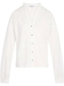 Chemisier blanc uni avec une coupe droite et des manches longues