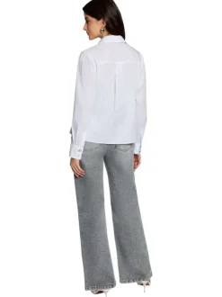 Chemisier blanc uni avec une coupe droite et un col à revers