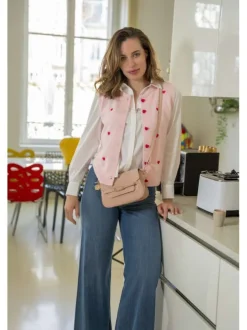 Chemisier blanc uni avec une coupe droite et un col à revers