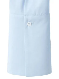 Chemisier bleu ciel uni avec une coupe ample et des manches longues