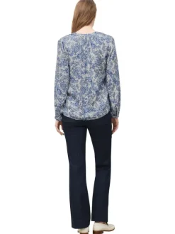Chemisier bleu floral avec une coupe droite et un col tunisien