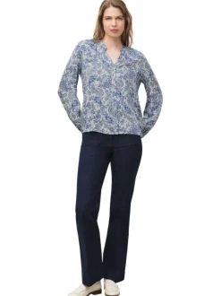 Chemisier bleu floral avec une coupe droite et un col tunisien