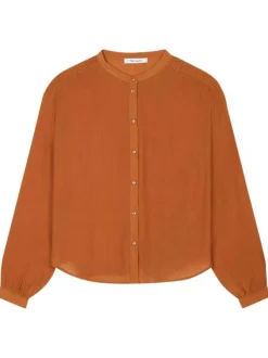 Chemisier boutonné orange avec une coupe droite et un col mao