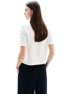 Chemisier écru uni avec une coupe droite et un col à revers