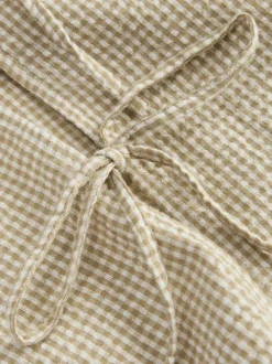 Chemisier en coton beige pourvu d'un motif à carreaux et de manches longues