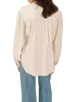 Chemisier en coton beige uni en velours avec une coupe ample et un col rond