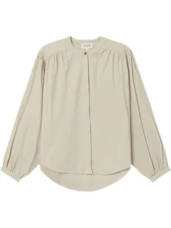 Chemisier en coton beige uni en velours avec une coupe ample et un col rond