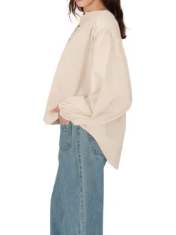 Chemisier en coton beige uni en velours avec une coupe ample et un col rond