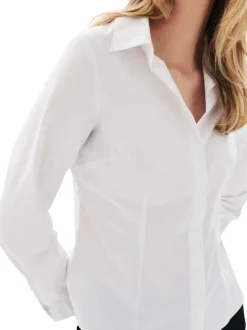 Chemisier en coton biologique blanc uni avec une coupe ajustée