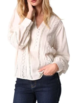 Chemisier en coton blanc avec un col v profond et des manches longues