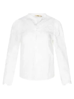 Chemisier en coton blanc brodé avec un col rond et une coupe ajustée