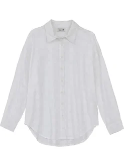 Chemisier en coton blanc brodé avec une coupe droite et un col à revers