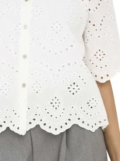 Chemisier en coton blanc uni avec une coupe droite et un col à revers