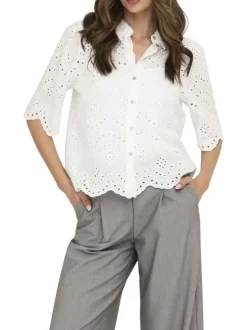 Chemisier en coton blanc uni avec une coupe droite et un col à revers