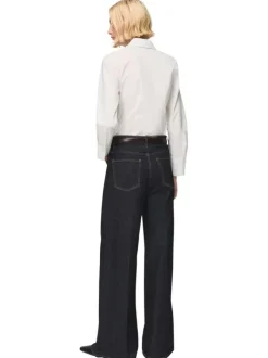 Chemisier en coton blanc uni avec une coupe droite et un col à revers