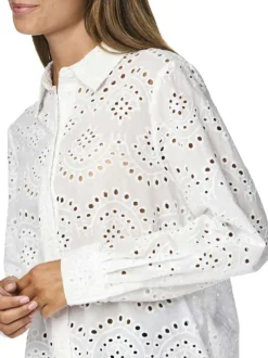 Chemisier en coton blanc uni à dentelle avec une coupe droite et un col à revers