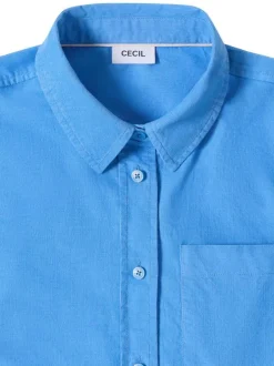Chemisier en coton bleu uni pourvu d'une coupe droite et d'un col français