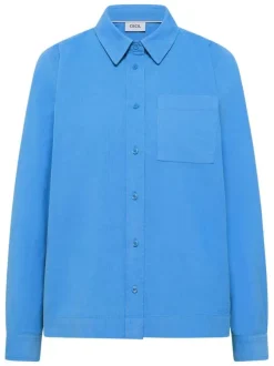 Chemisier en coton bleu uni pourvu d'une coupe droite et d'un col français