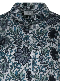 Chemisier en coton écru avec des motifs fleuris et une coupe droite