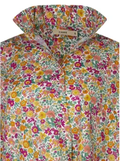 Chemisier en coton fuchsia à motifs avec une coupe droite et un col montant