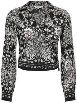 Chemisier en coton noir à motifs pourvu d'une coupe cintrée