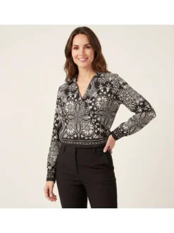 Chemisier en coton noir à motifs pourvu d'une coupe cintrée